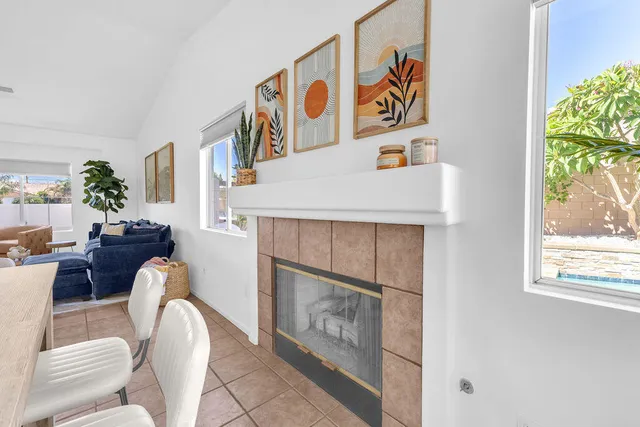 a kitchen with stainless steel appliances kitchen island granite countertop a sink and cabinets