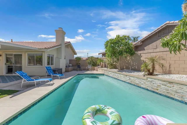 a view of a back yard of the house