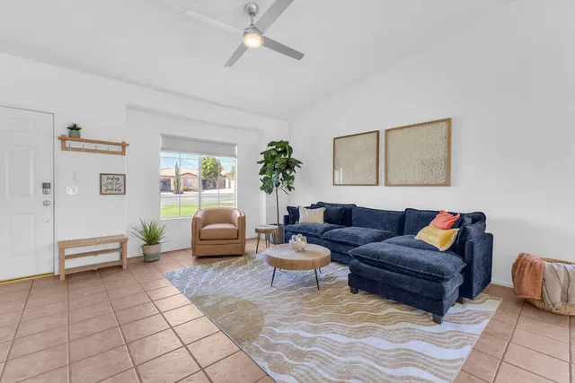 a living room with furniture and a couch