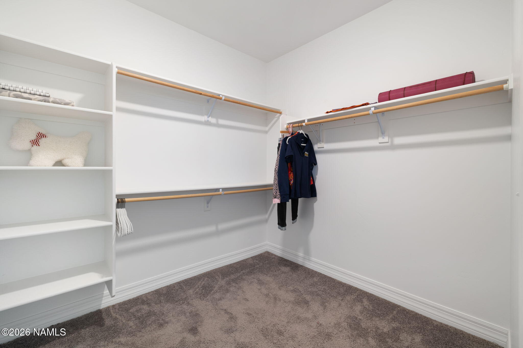 11951 Hydrus Road Bellemont, AZ 86015 - Photo 19 of 47 Primary Closet Downstairs