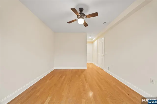 a view of a big room with carpet