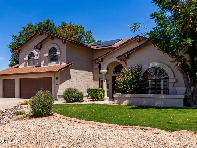 a house view with a garden space