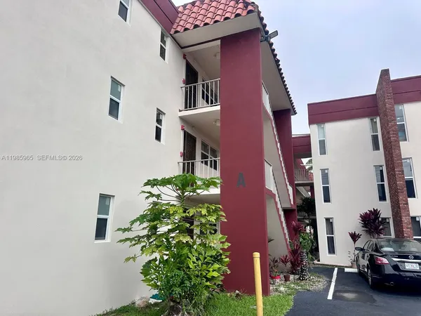a car parked in front of a building