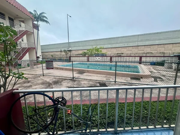 a bathroom with a toilet a sink and a mirror