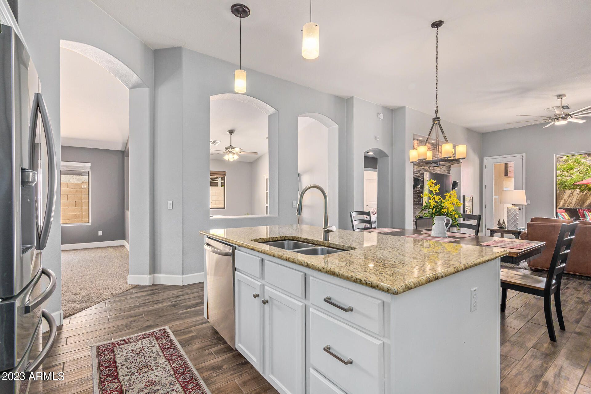 2065 South Marble Street Gilbert, AZ 85295 - Photo 14 of 59 a kitchen with sink and refrigerator