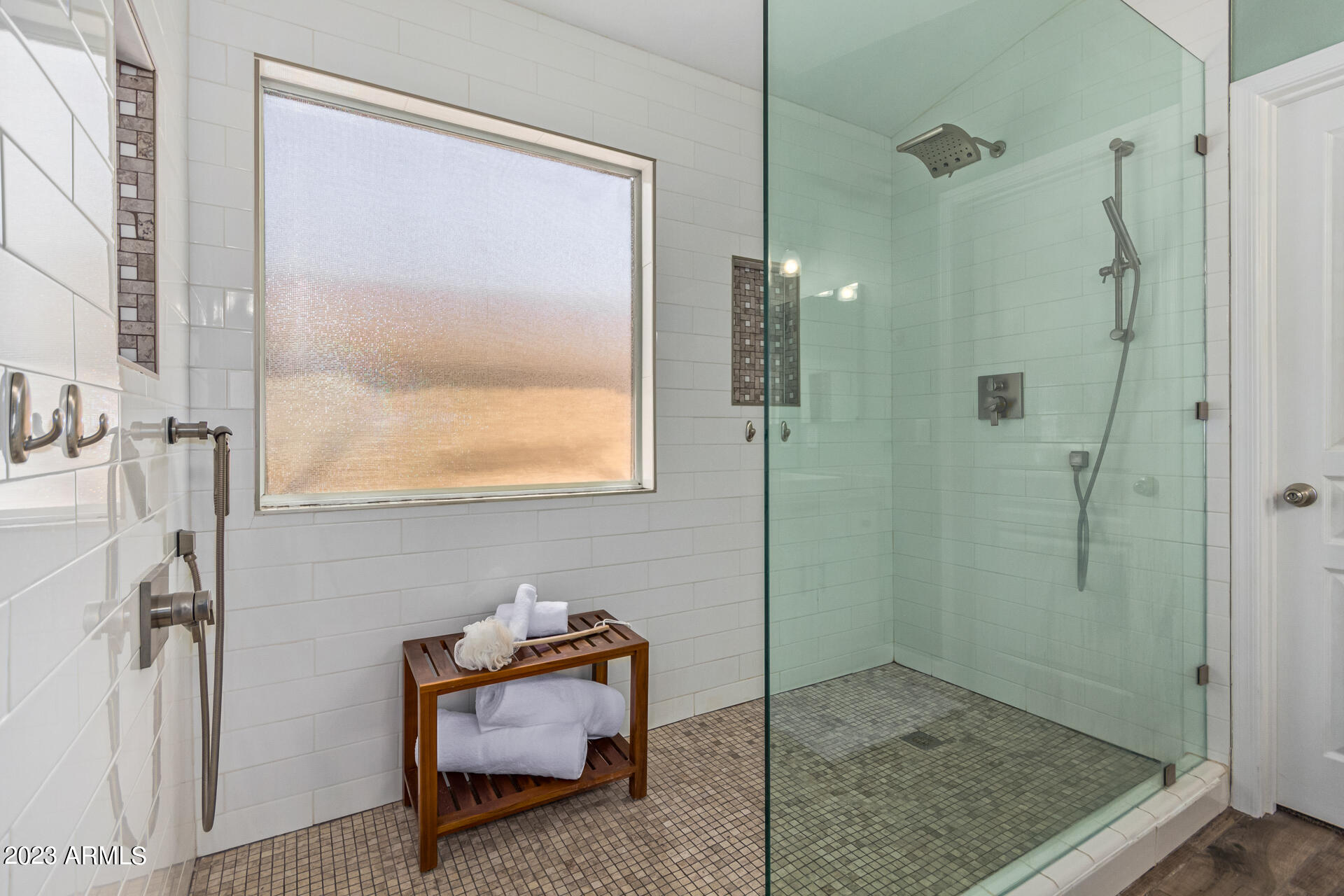 2065 South Marble Street Gilbert, AZ 85295 - Photo 25 of 59 a bathroom with a window and a shower