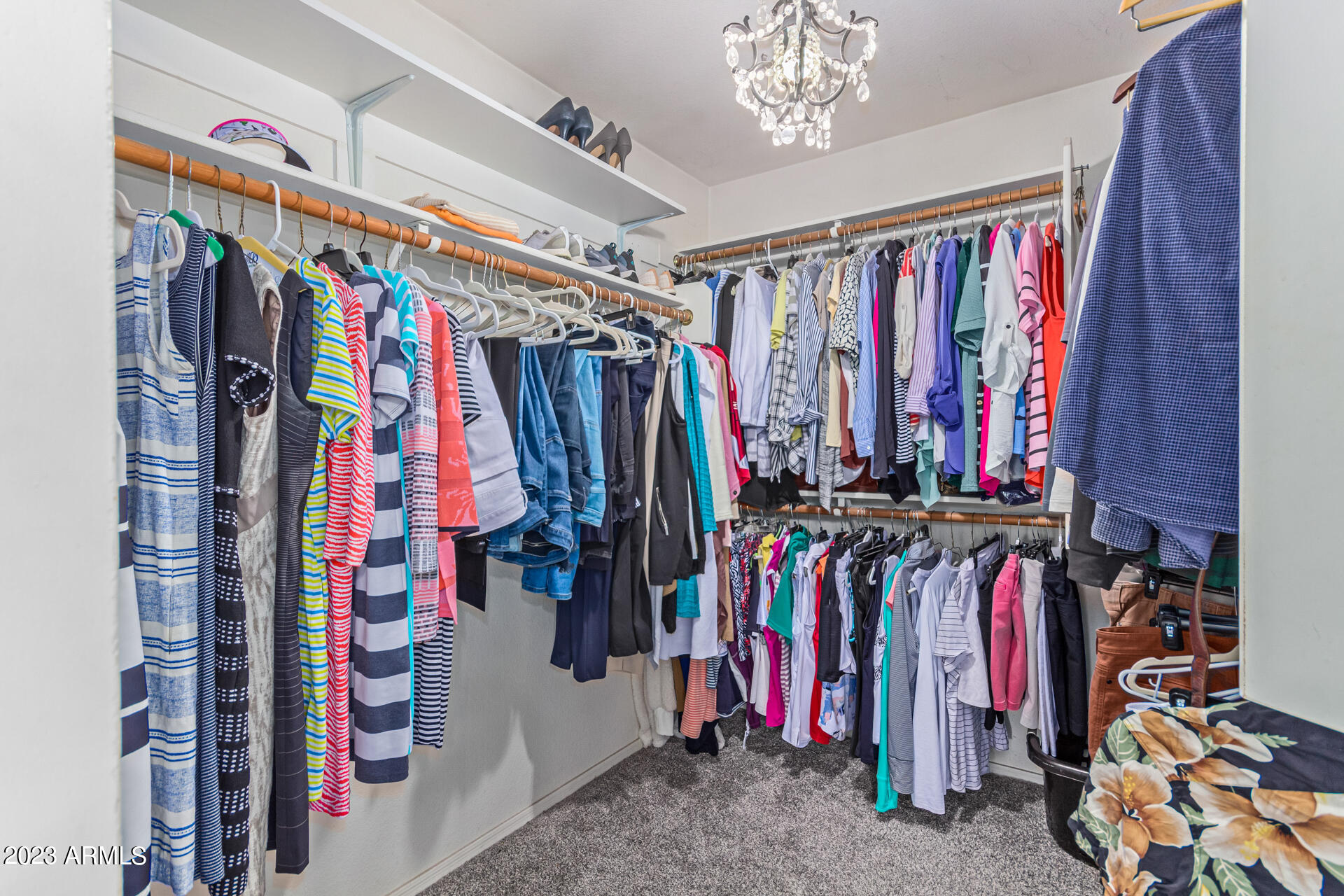 2065 South Marble Street Gilbert, AZ 85295 - Photo 26 of 59 a view of walk in closet with clothes