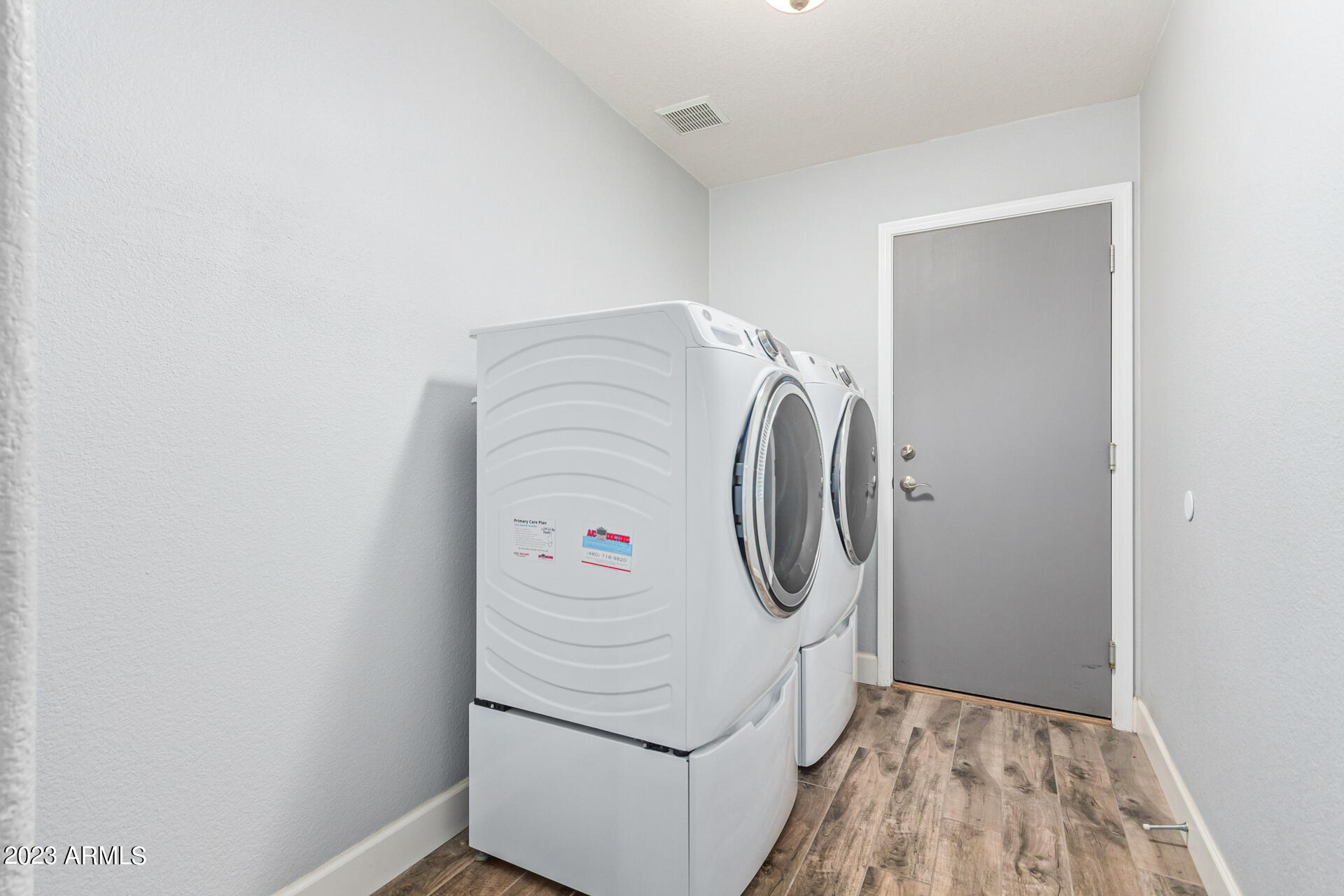 2065 South Marble Street Gilbert, AZ 85295 - Photo 31 of 59 a utility room with dryer and washer