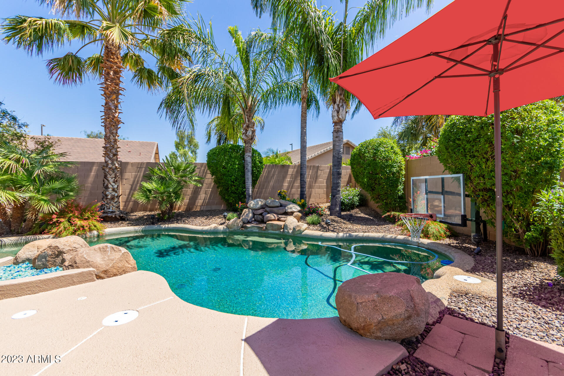 2065 South Marble Street Gilbert, AZ 85295 - Photo 34 of 59 a view of a backyard with sitting area and furniture