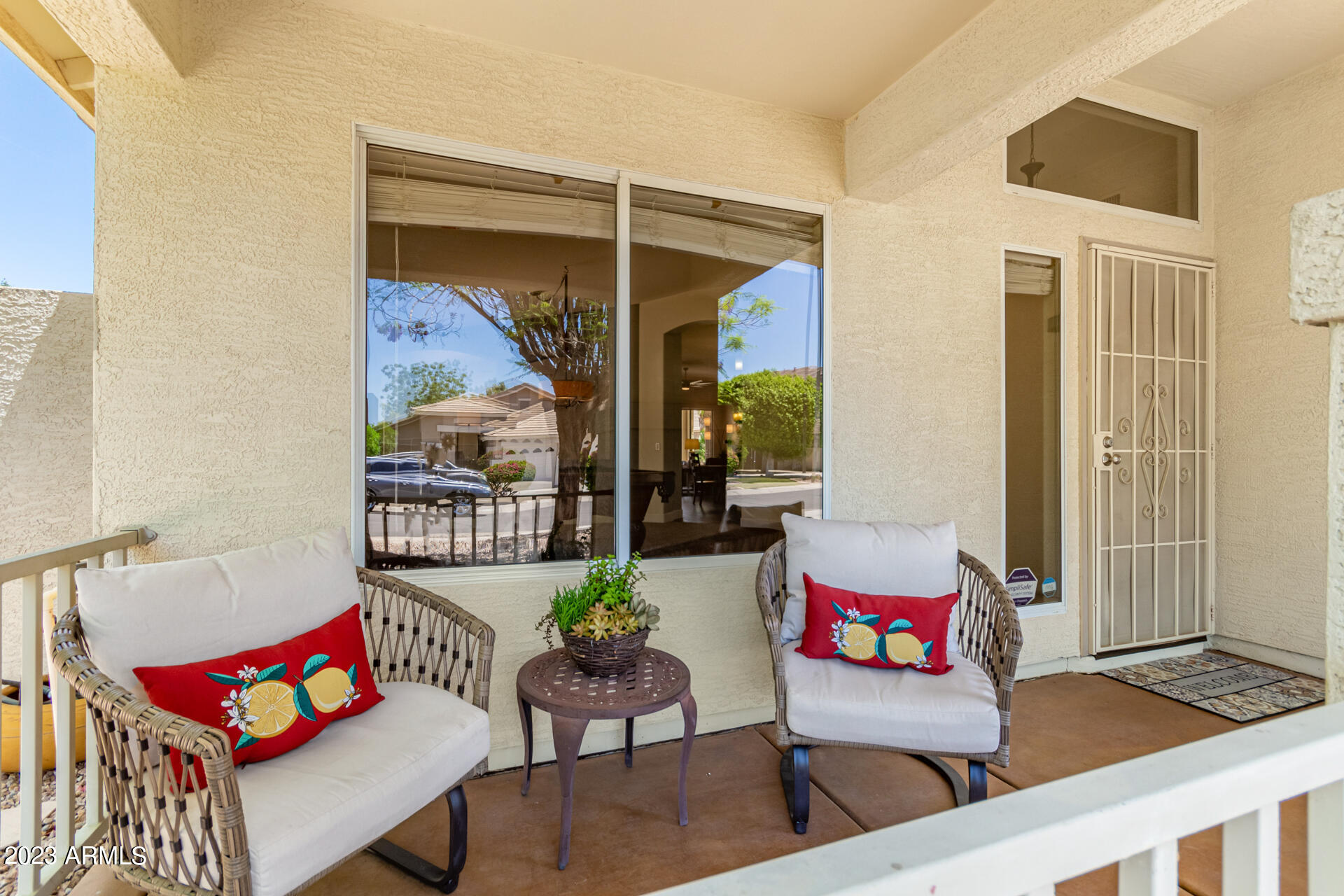 2065 South Marble Street Gilbert, AZ 85295 - Photo 4 of 59 a living room with furniture and a window