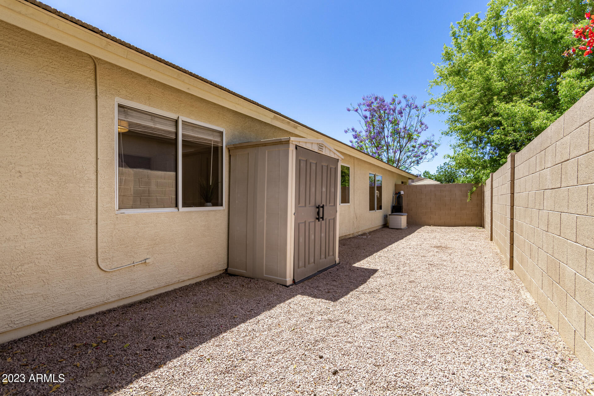 2065 South Marble Street Gilbert, AZ 85295 - Photo 47 of 59 a view of a house with a yard