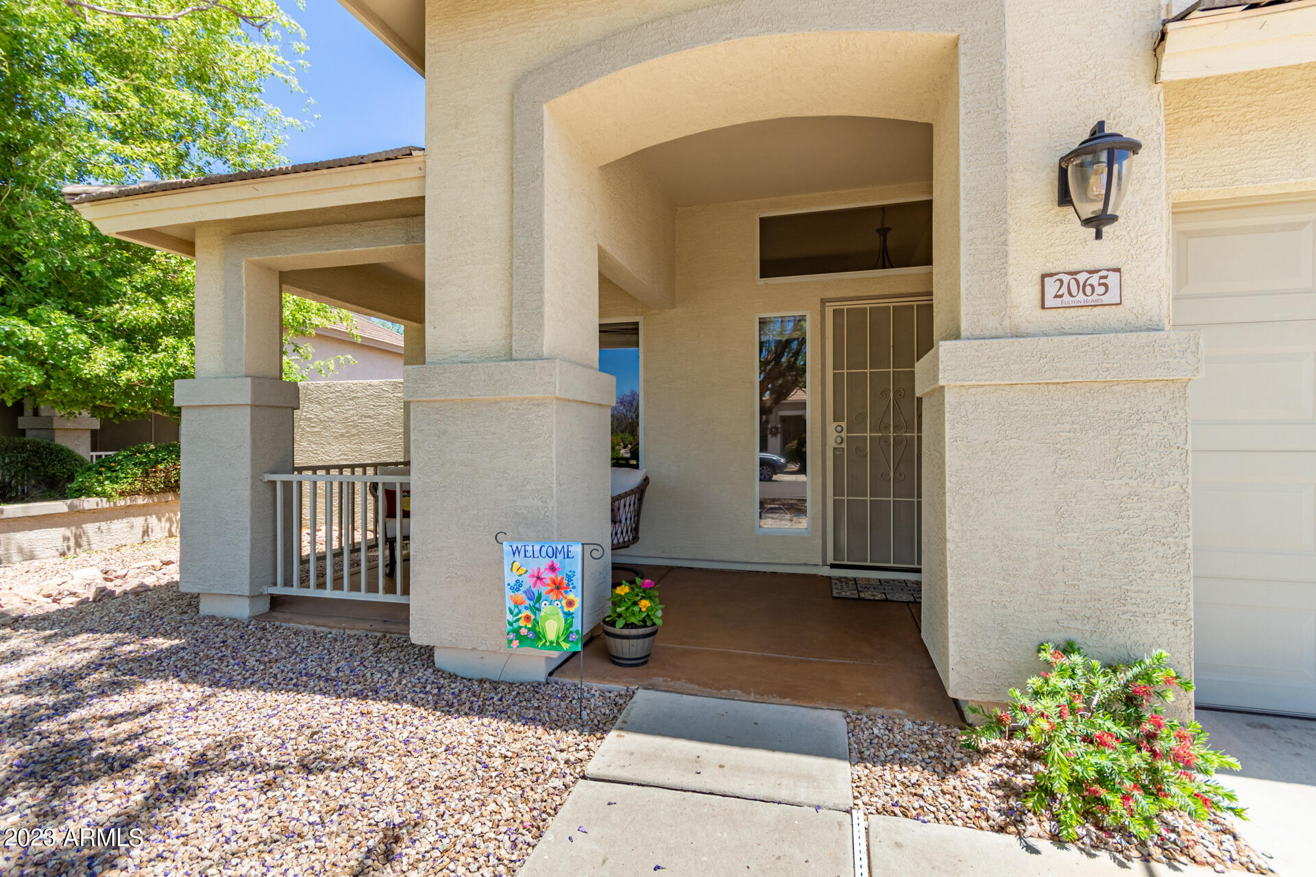 2065 South Marble Street Gilbert, AZ 85295 - Photo 52 of 59 a front view of a house