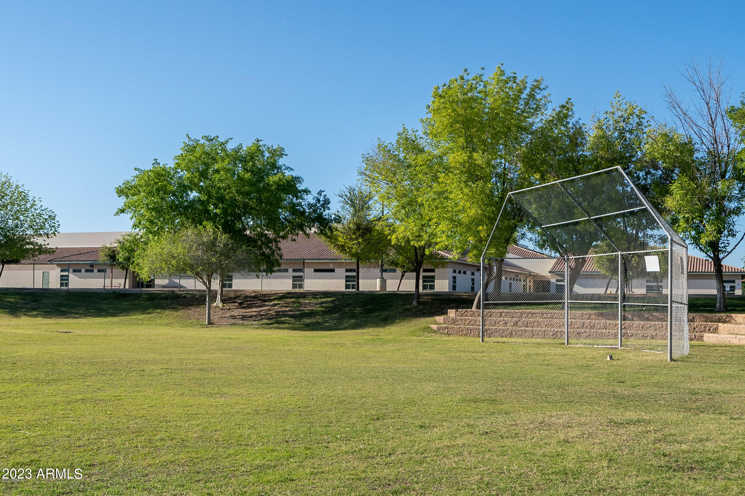 2065 South Marble Street Gilbert, AZ 85295 - Photo 59 of 59 a backyard of a house with lots of green space