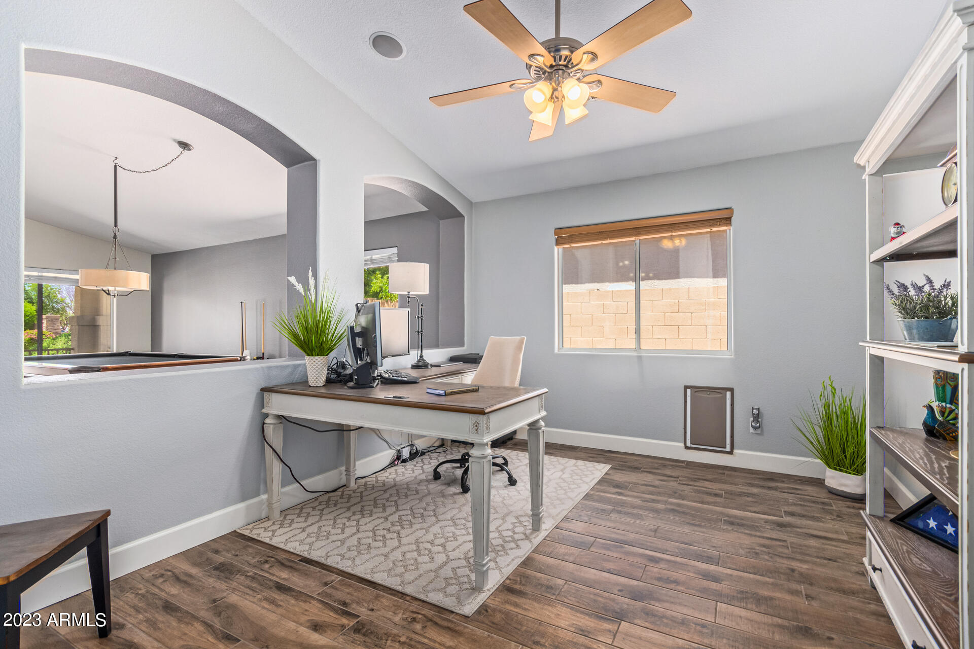 2065 South Marble Street Gilbert, AZ 85295 - Photo 9 of 59 a view of a workspace with furniture and a window