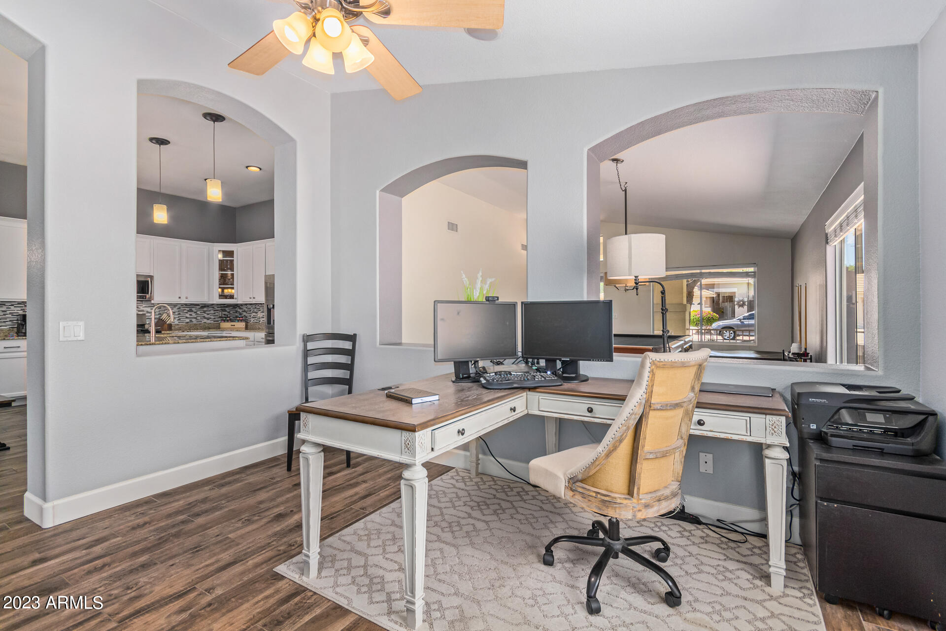 2065 South Marble Street Gilbert, AZ 85295 - Photo 10 of 59 a view of a workspace with furniture and a window