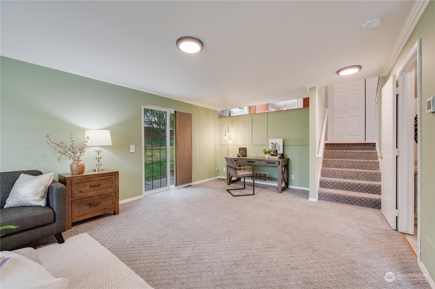 1816 243rd Place Southeast Bothell, WA 98021 - Photo 10 of 29 a view of a livingroom with furniture and a ceiling fan