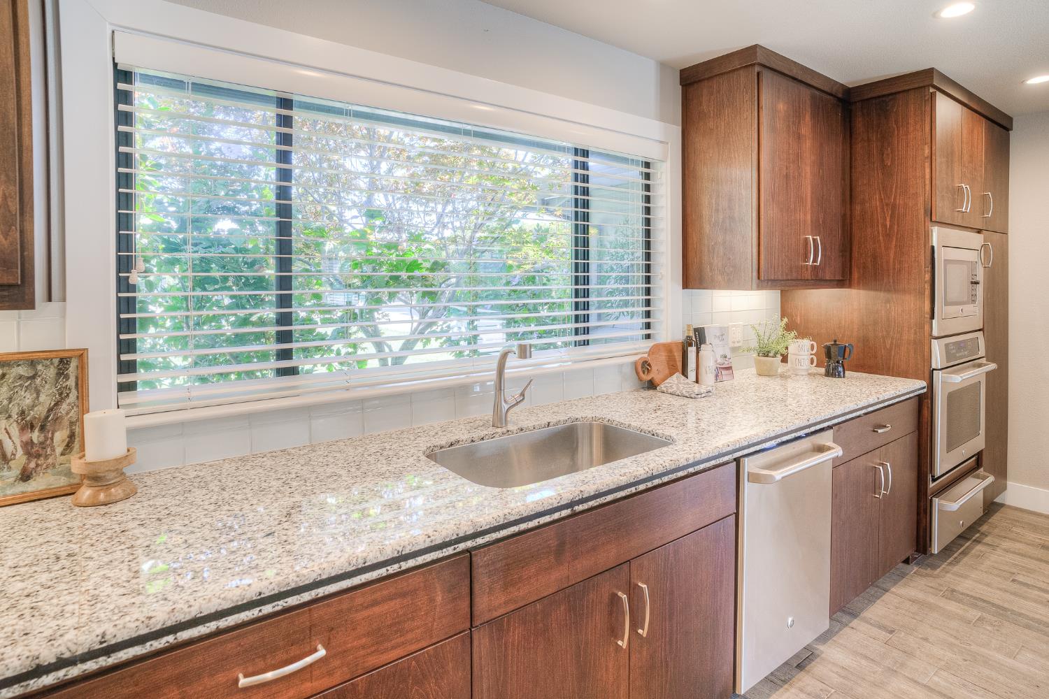 800 South Meridian Road Meridian, CA 95957 - Photo 15 of 81 a kitchen with granite countertop a sink and a window