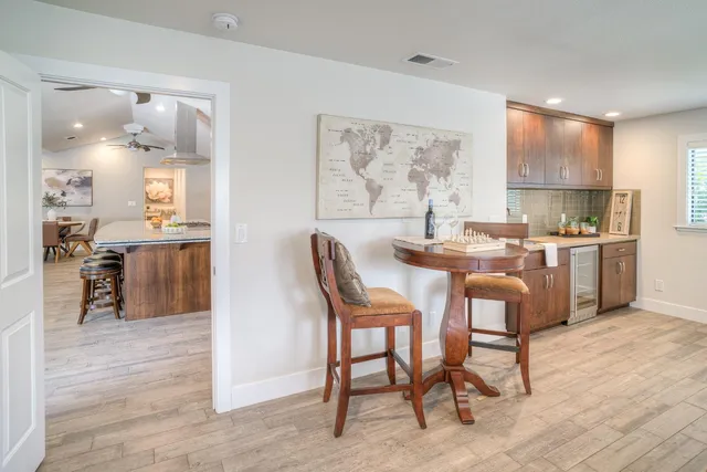 a bedroom with furniture and a window