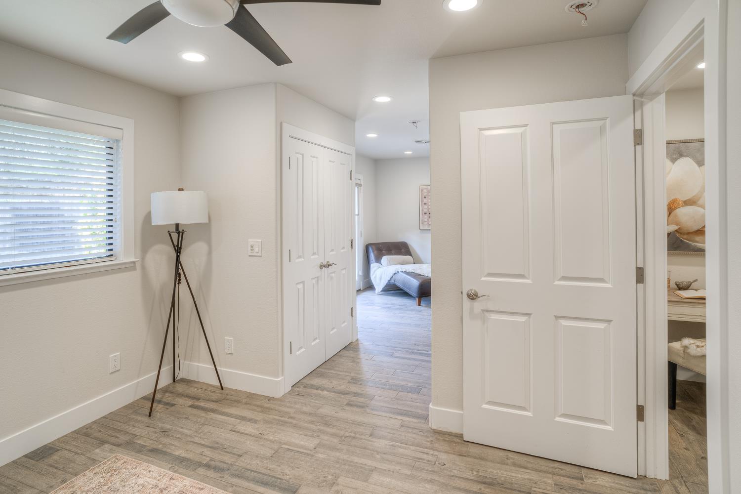 800 South Meridian Road Meridian, CA 95957 - Photo 28 of 81 a view of a hallway with wooden floor windows and a livingroom
