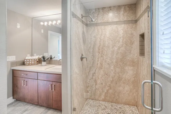 an aerial view of a house with a swimming pool