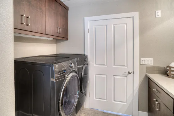 a view of a house with a yard and a garden