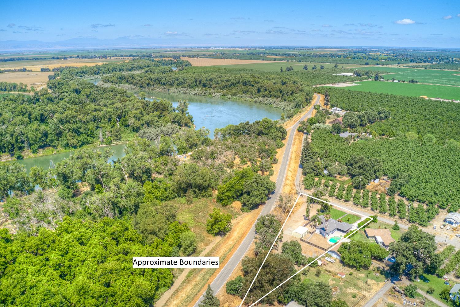 800 South Meridian Road Meridian, CA 95957 - Photo 70 of 81 a view of a lake with a yard
