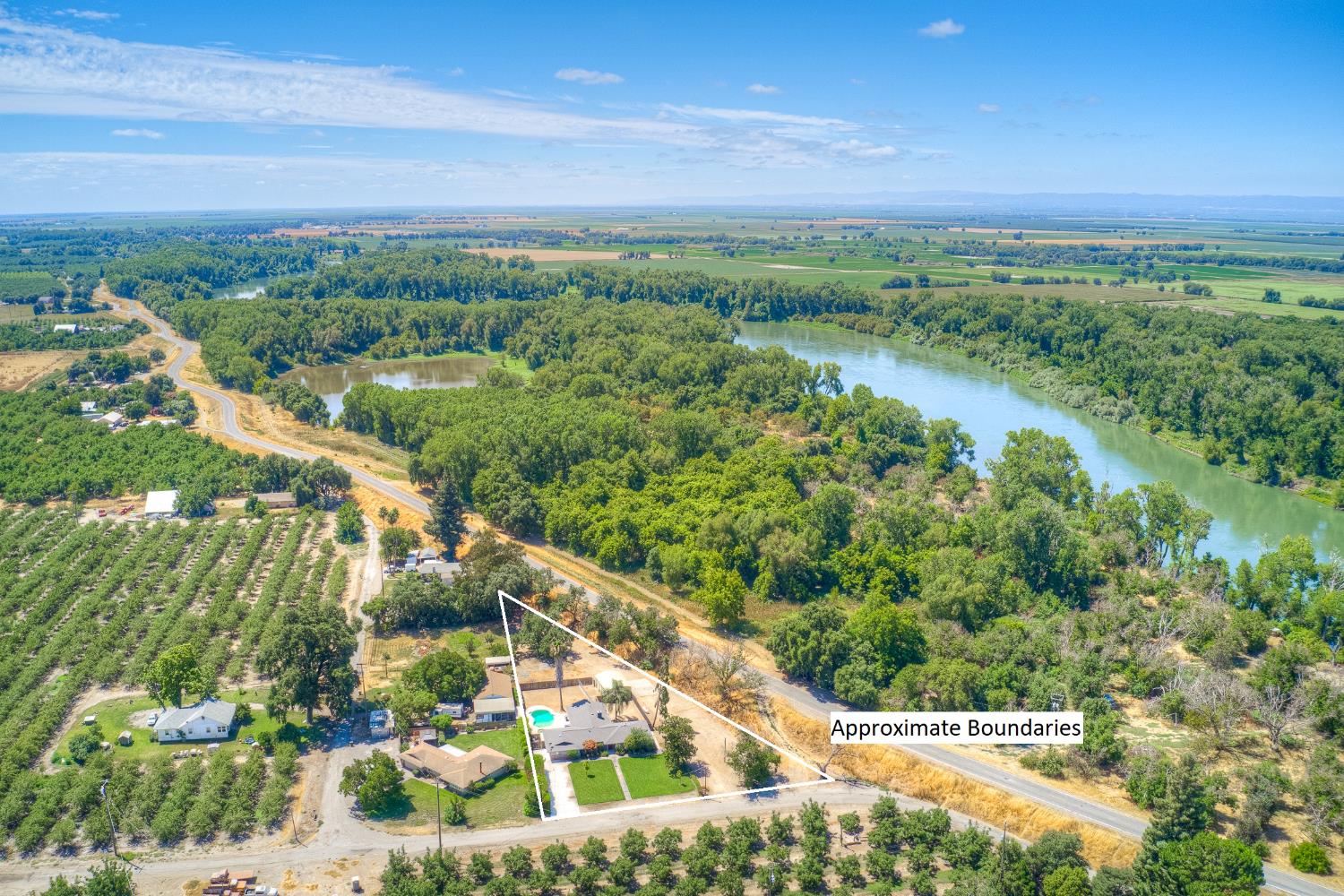 800 South Meridian Road Meridian, CA 95957 - Photo 71 of 81 a view of a garden with a building in the background