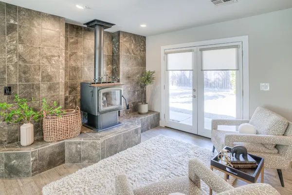 a living room with furniture and a large window