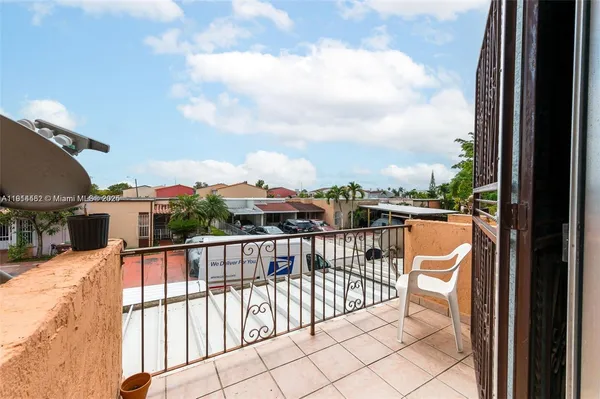 a view of a balcony with city view