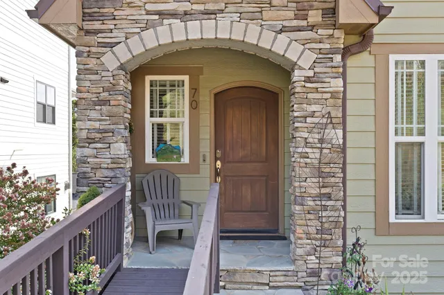 a front view of a house with balcony