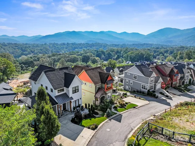 an aerial view of a house with a garden