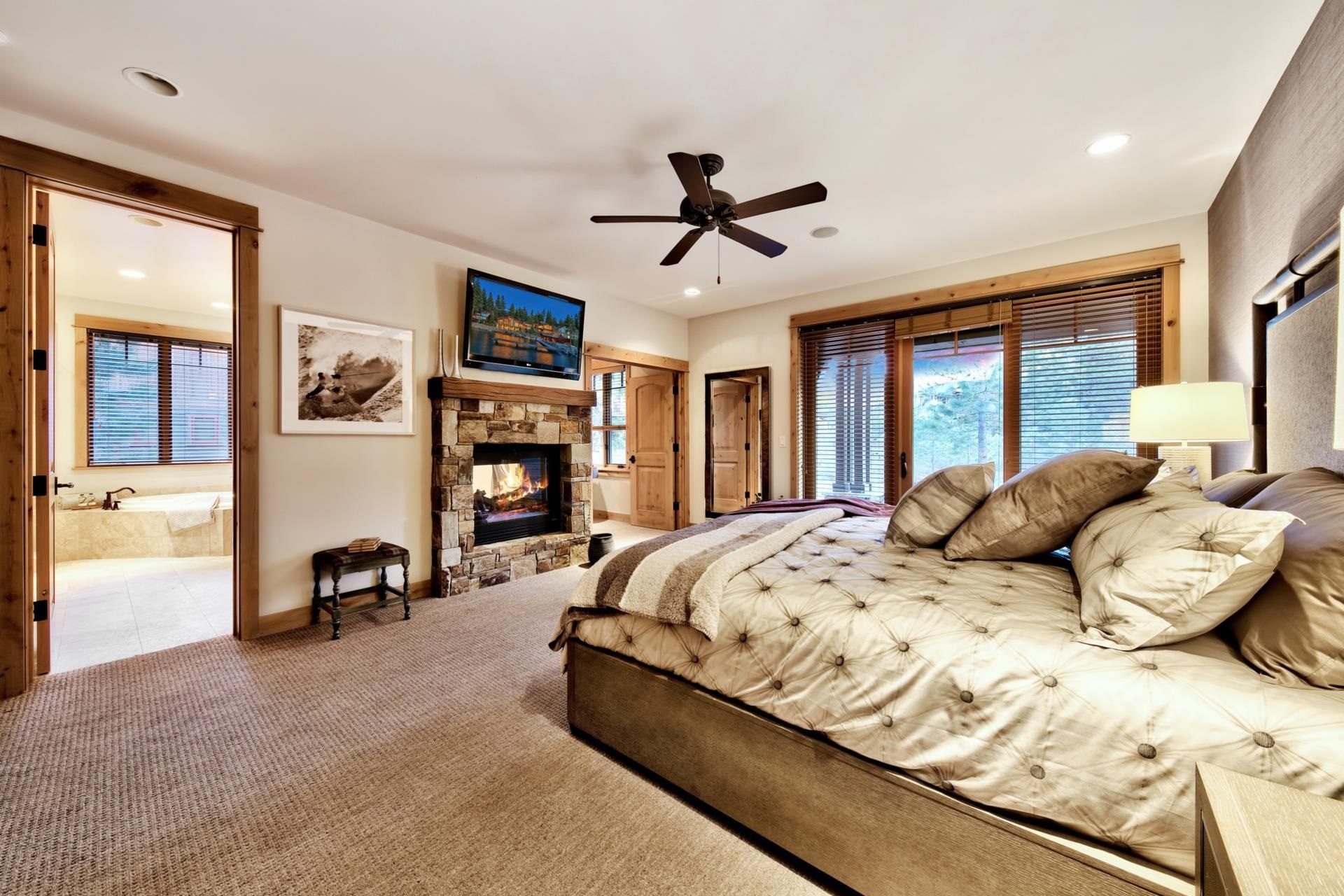 10239 Valmont Trail Truckee, CA 96161 - Photo 13 of 21 a bedroom with a bed and a large window