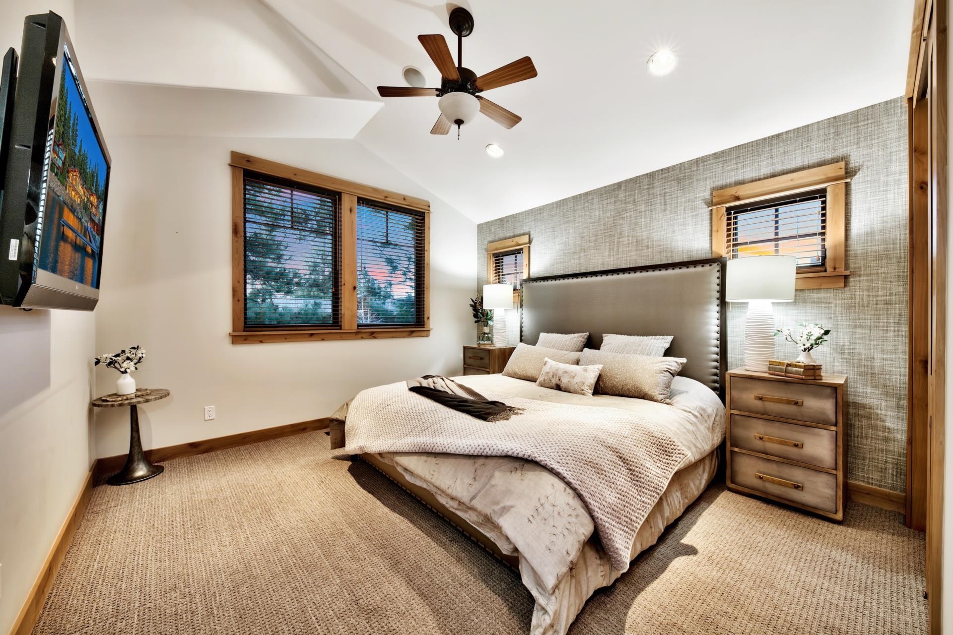 10239 Valmont Trail Truckee, CA 96161 - Photo 16 of 21 a bedroom with a bed dresser and a window