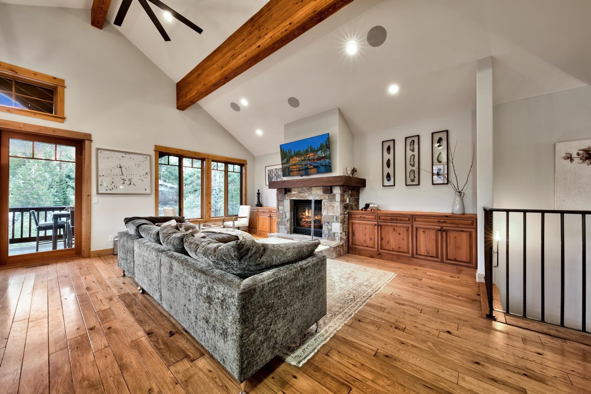 10239 Valmont Trail Truckee, CA 96161 - Photo 3 of 21 a living room with fireplace furniture and a wooden floor