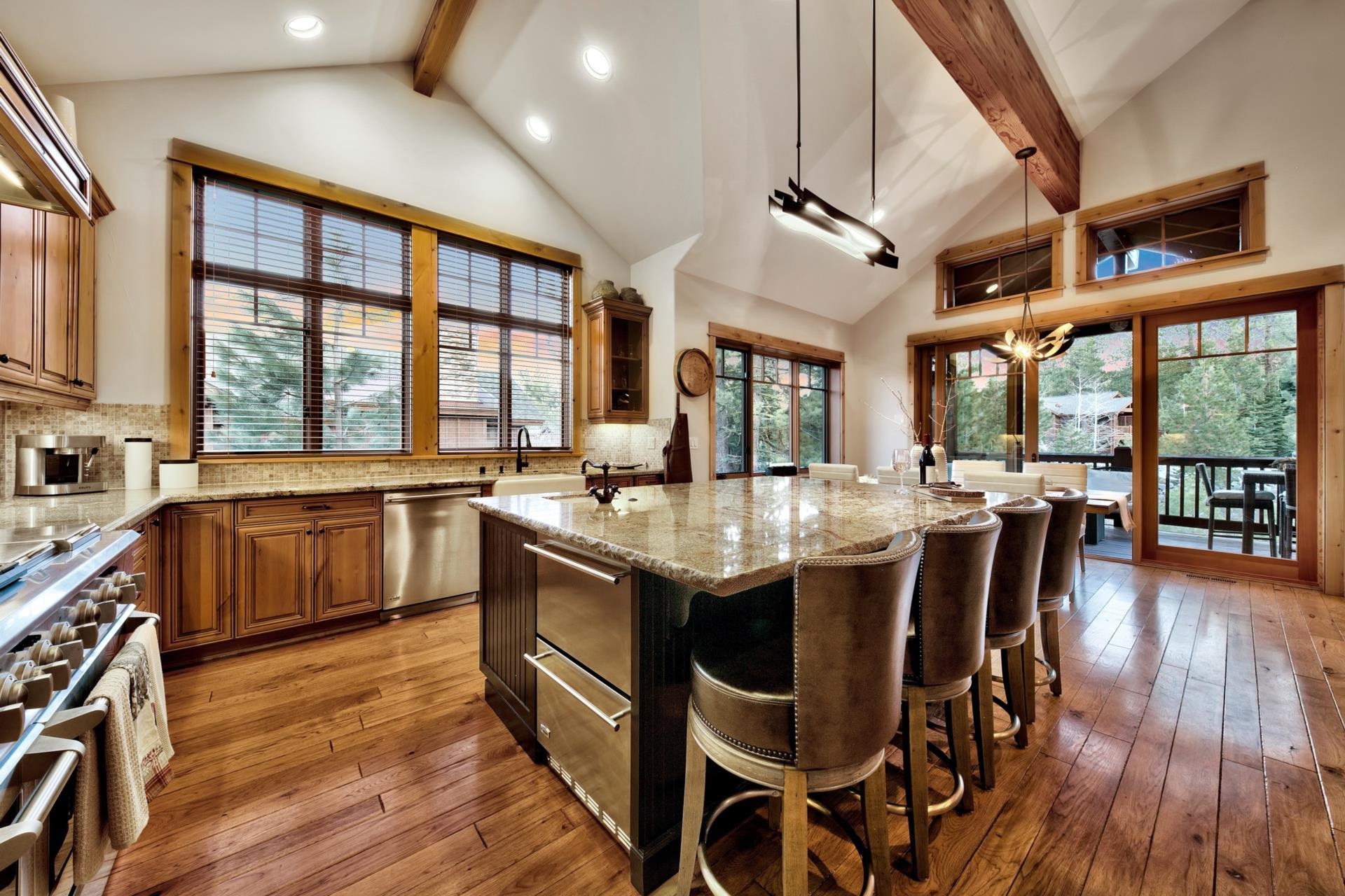 10239 Valmont Trail Truckee, CA 96161 - Photo 4 of 21 a kitchen with stainless steel appliances granite countertop a stove and a wooden floors