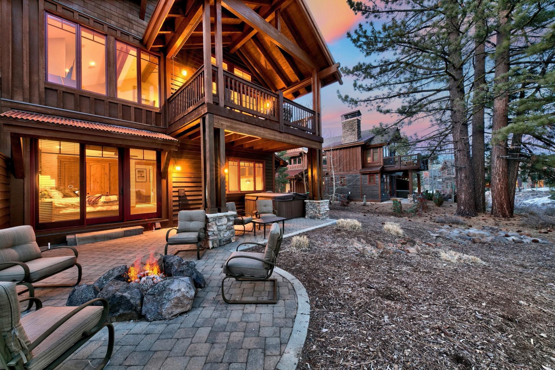 10239 Valmont Trail Truckee, CA 96161 - Photo 6 of 21 a outdoor space with the couches and dining table under an umbrella
