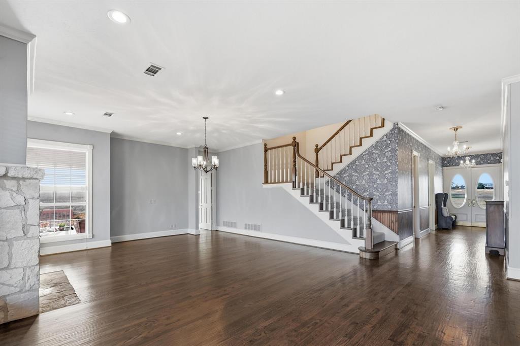 707 Cullins Road Rockwall, TX 75032 - Photo 8 of 40 a view of an entryway with wooden floor