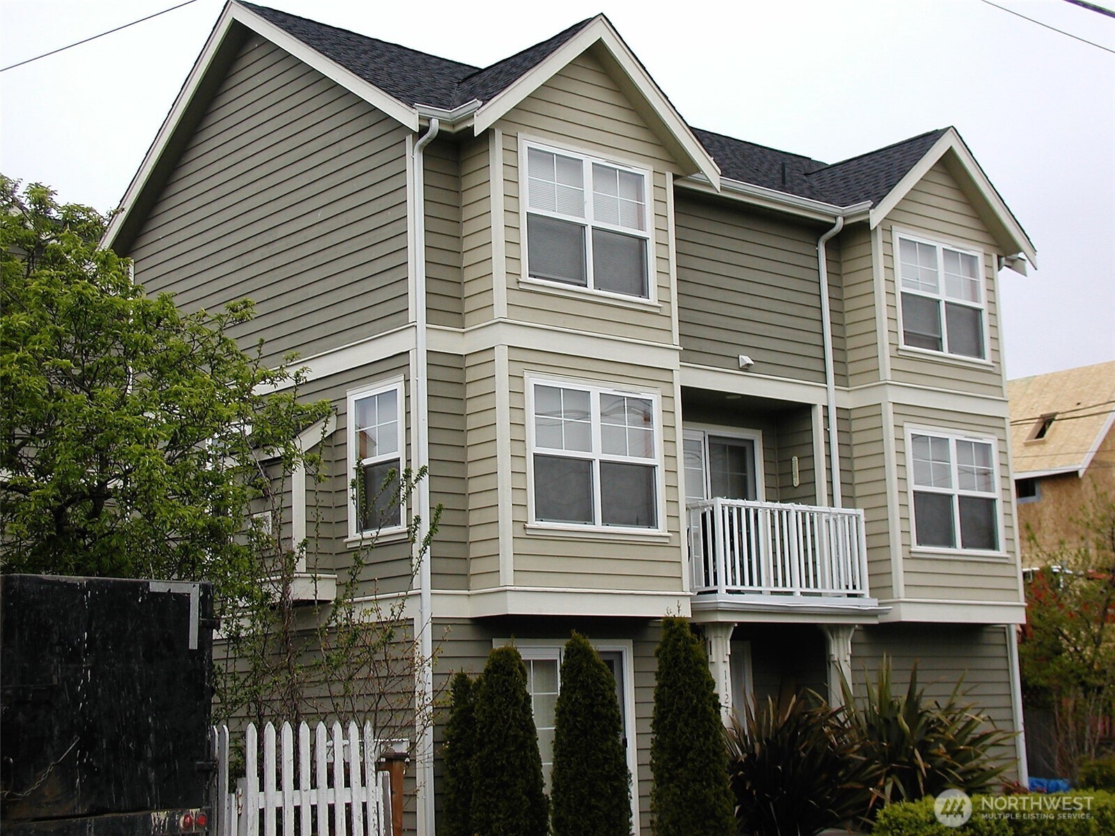 1126 Northwest 56th Street Seattle, WA 98107 - Photo 2 of 8 a view of a house with wooden deck