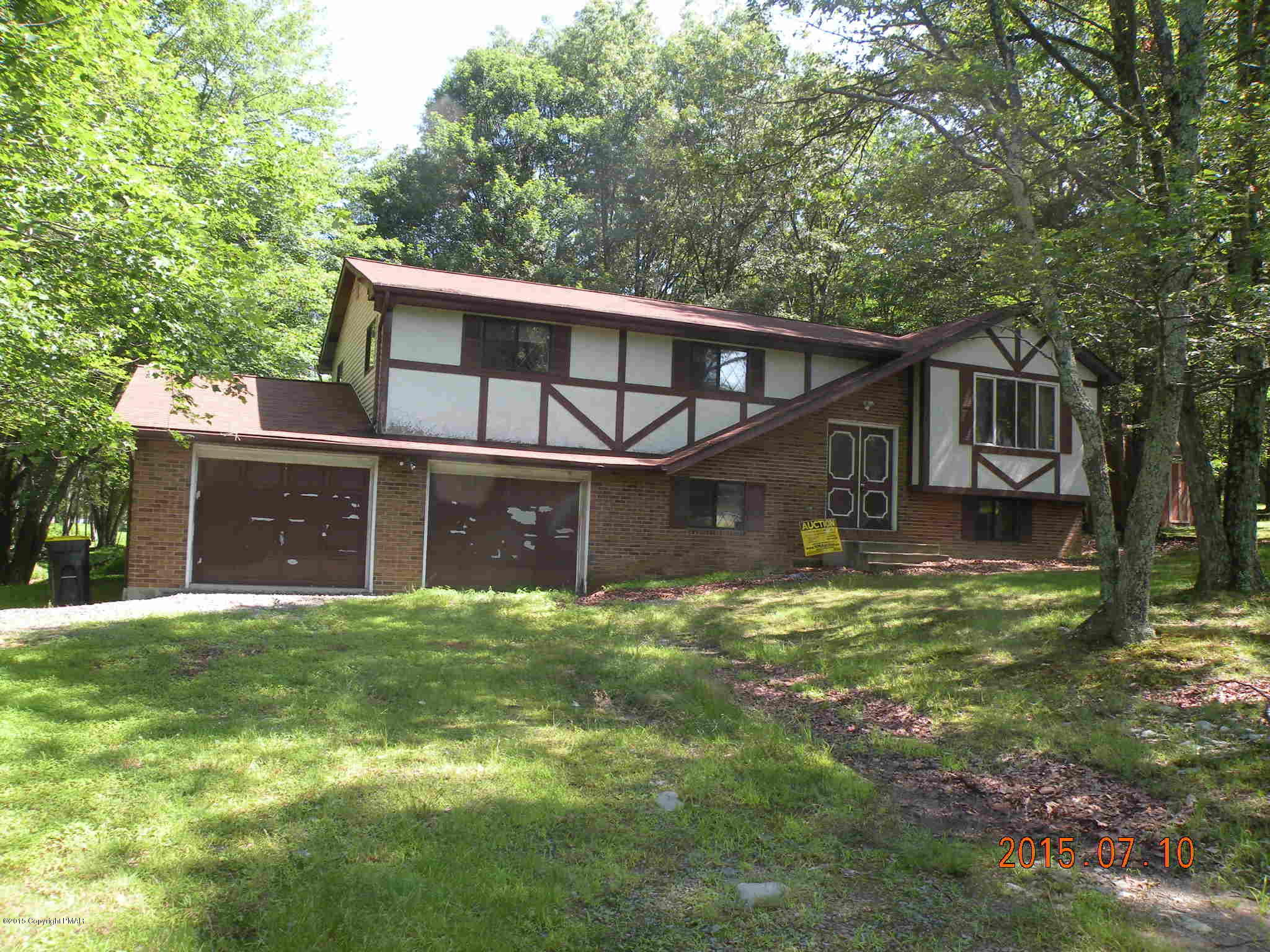 4146 Blueberry Hill Road Bushkill, PA 18324 - Photo 14 of 14 a view of a house with a yard