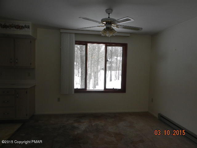 4146 Blueberry Hill Road Bushkill, PA 18324 - Photo 2 of 14 a view of an empty room with a window