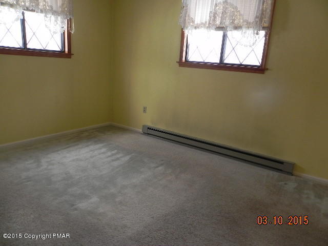 4146 Blueberry Hill Road Bushkill, PA 18324 - Photo 7 of 14 a view of a window in an empty room