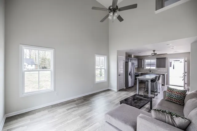 a living room with furniture and a window