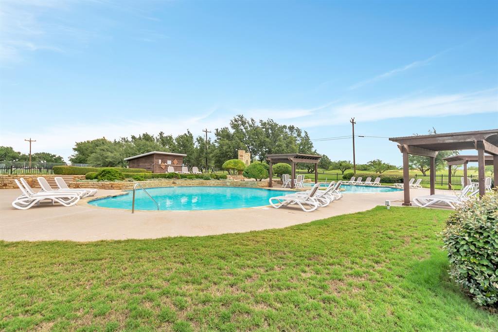 Tbd Turnberry Loop Graford, TX 76449 - Photo 12 of 15 a view of a swimming pool and a yard