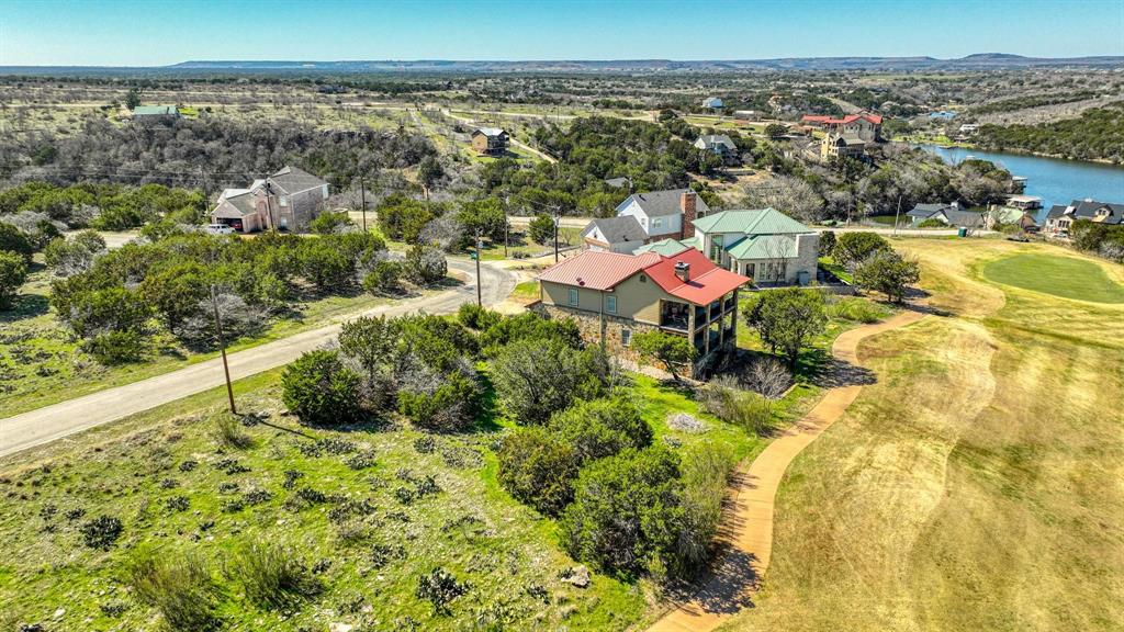Tbd Turnberry Loop Graford, TX 76449 - Photo 5 of 15 a view of a lake with a mountain