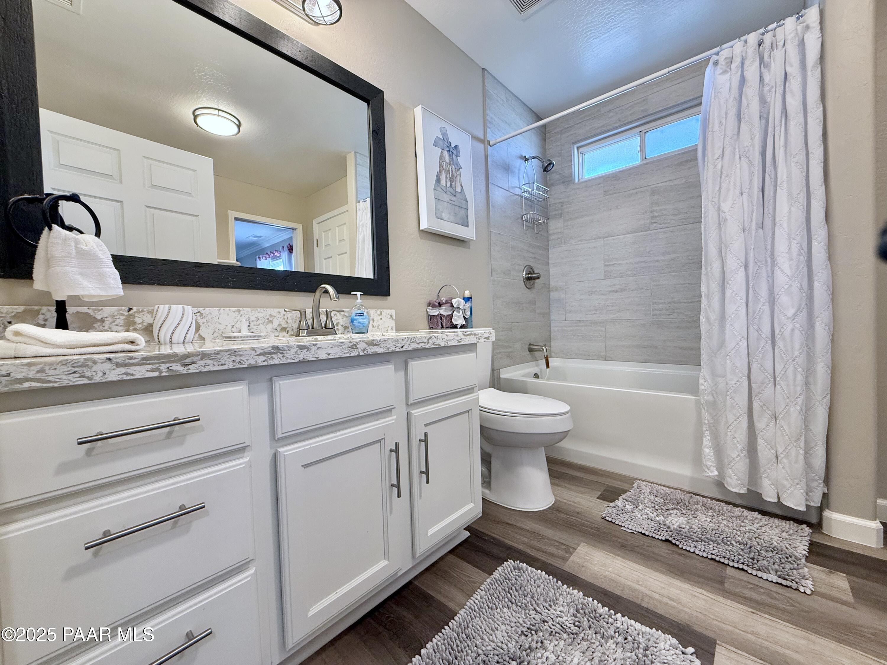 20233 East Sunset Lane Mayer, AZ 86333 - Photo 27 of 42 a bathroom with a sink a toilet and shower