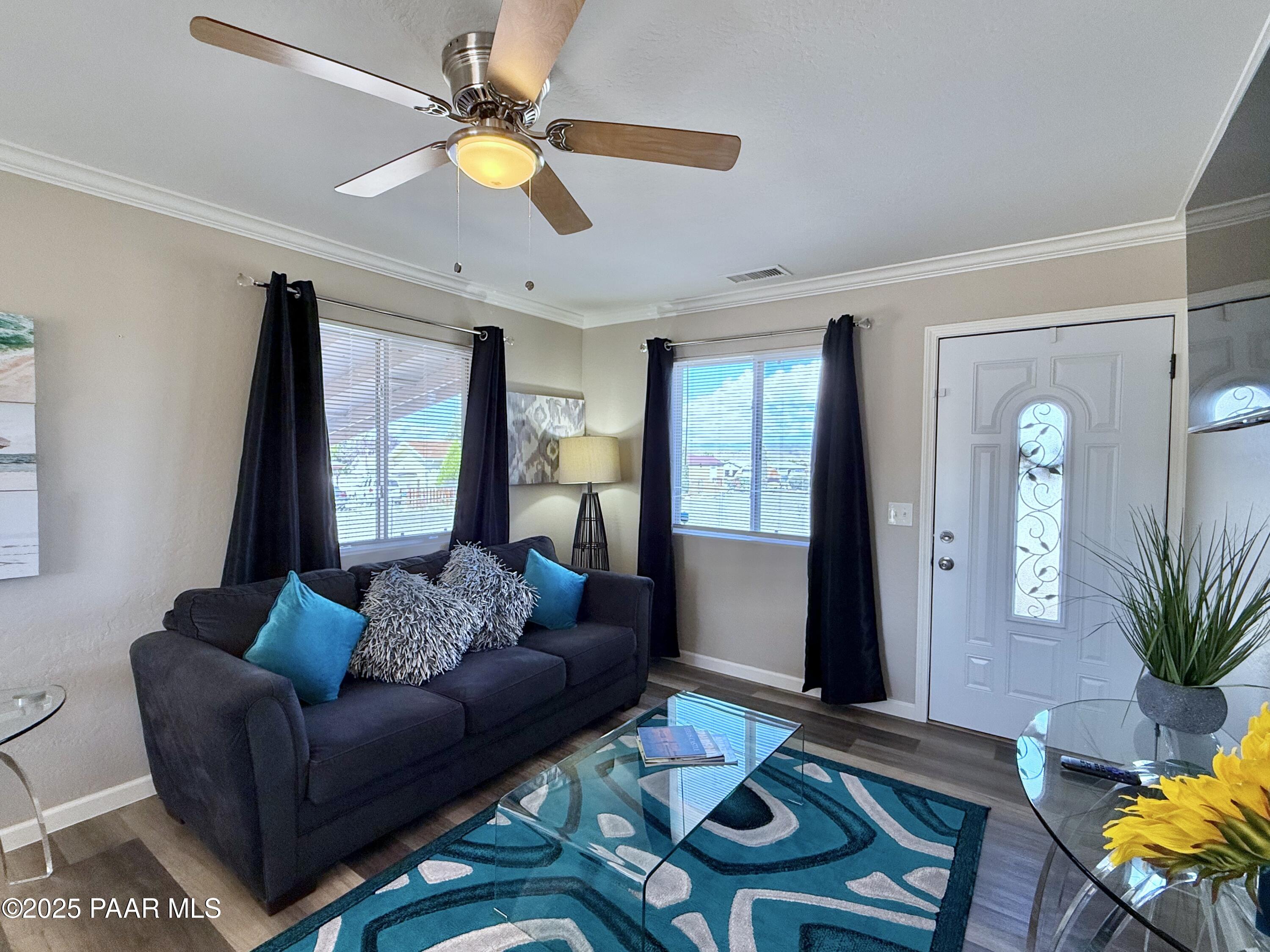 20233 East Sunset Lane Mayer, AZ 86333 - Photo 8 of 42 a living room with furniture and a large window