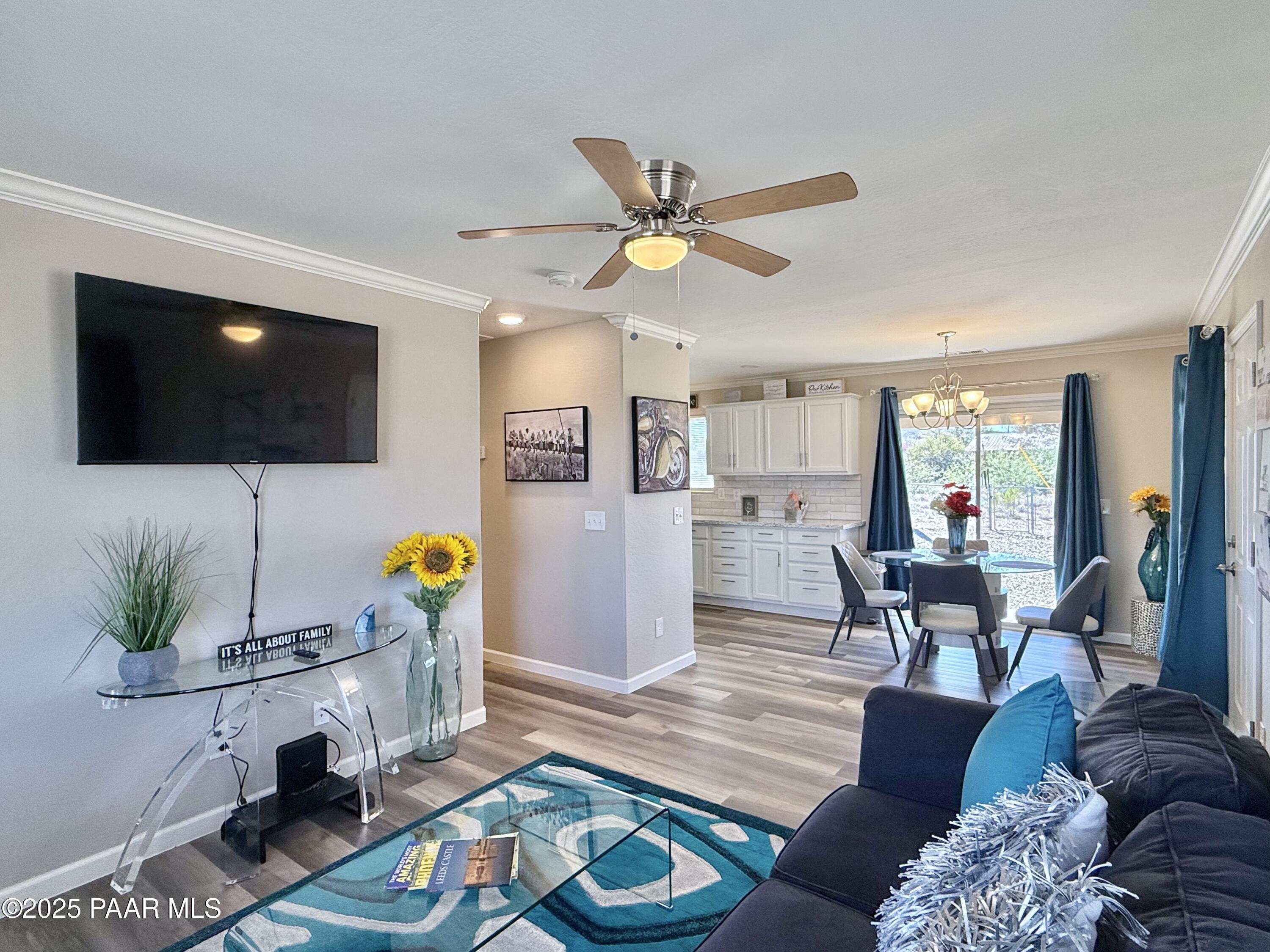 20233 East Sunset Lane Mayer, AZ 86333 - Photo 10 of 42 a living room with furniture and a flat screen tv