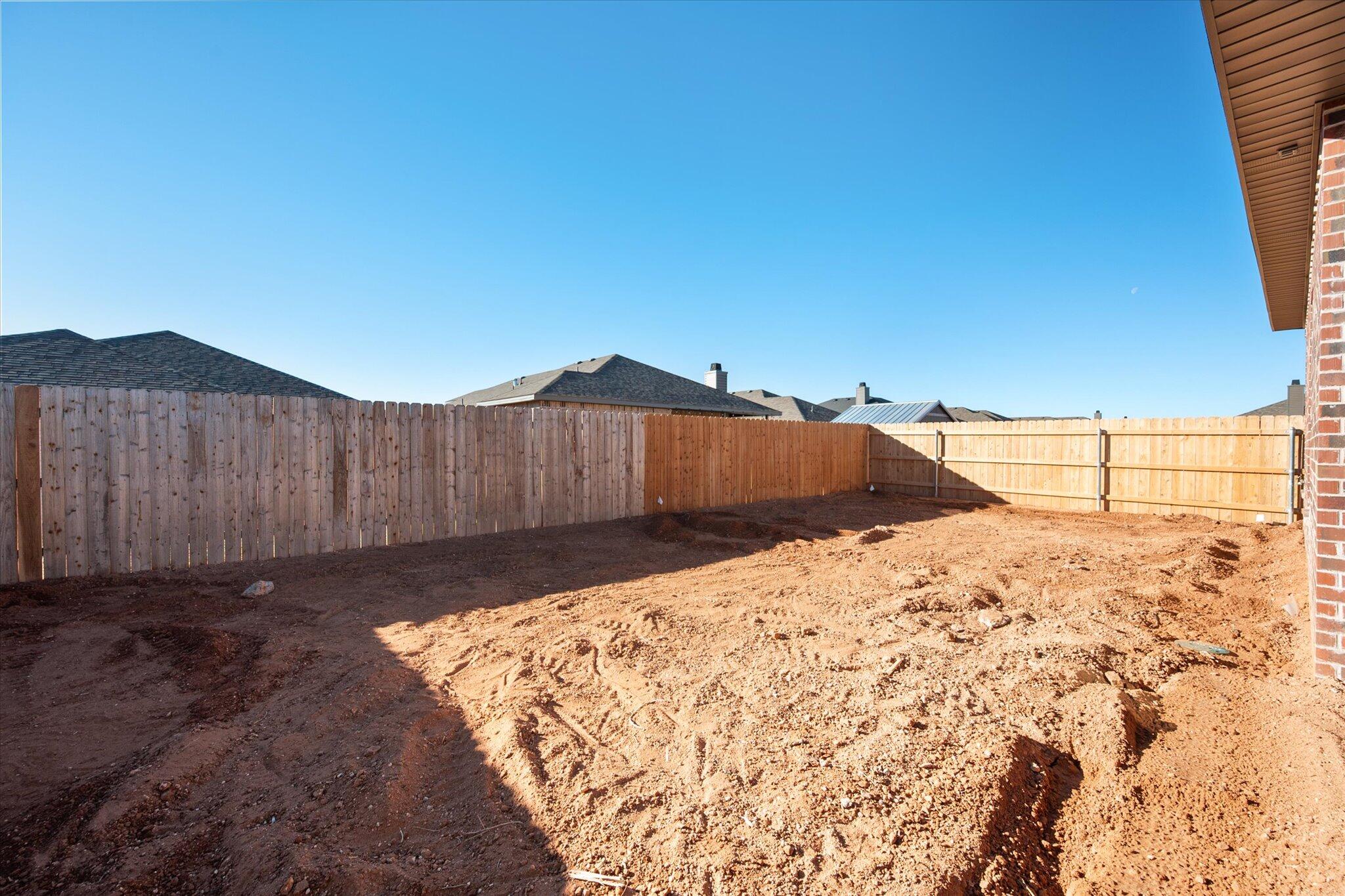 709 East 30th Street Wolfforth, TX 79382 - Photo 24 of 25 a view of a backyard of the house