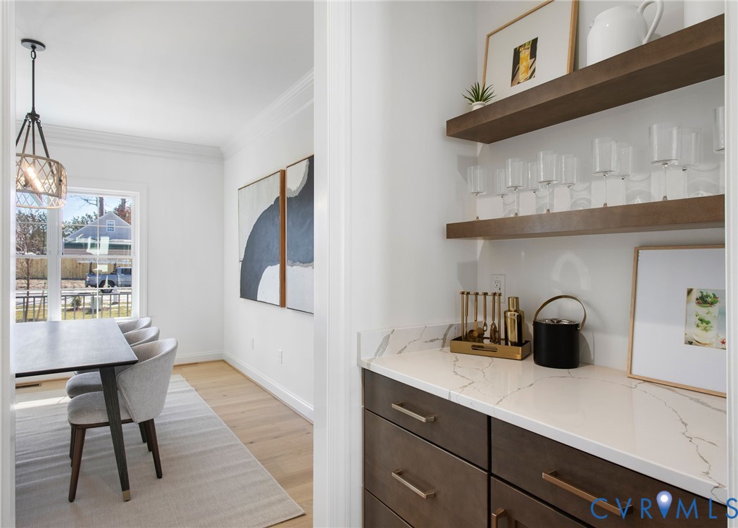 2831 Old Pump Road Henrico, VA 23233 - Photo 17 of 42 a kitchen with a wooden floor and cabinets