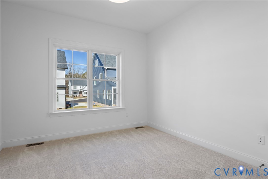 2831 Old Pump Road Henrico, VA 23233 - Photo 20 of 42 an empty room with a window